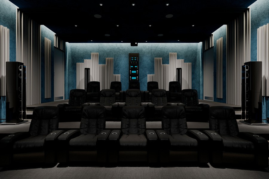 A home theater with tiered seating and McIntosh loudspeakers.